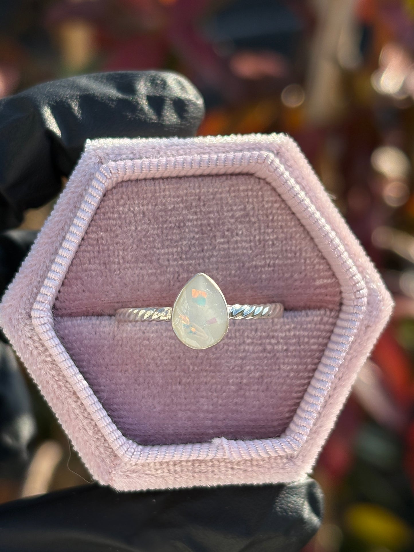 The Twisted Pear Ring