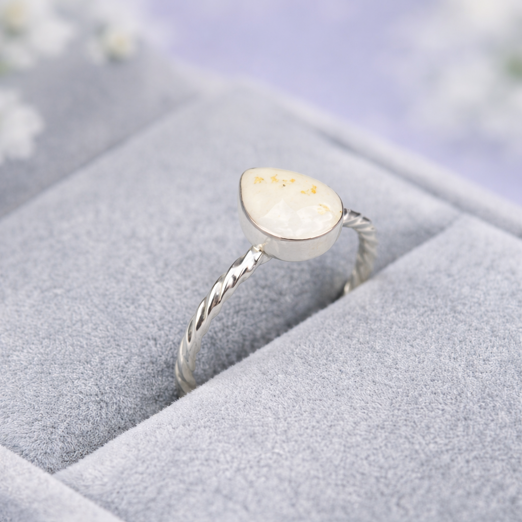 The Twisted Pear Ring